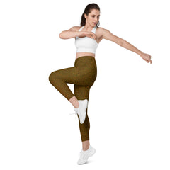 Leaf-patterned leggings with pockets, embodying the essence of earthy foliage for an adventurous look.