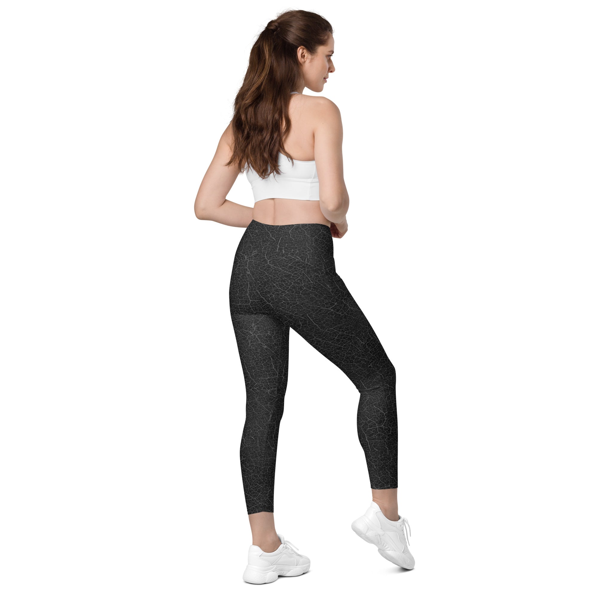 Nature-inspired Botanical Bliss leggings with pockets, perfect for blending fitness with eco-style.