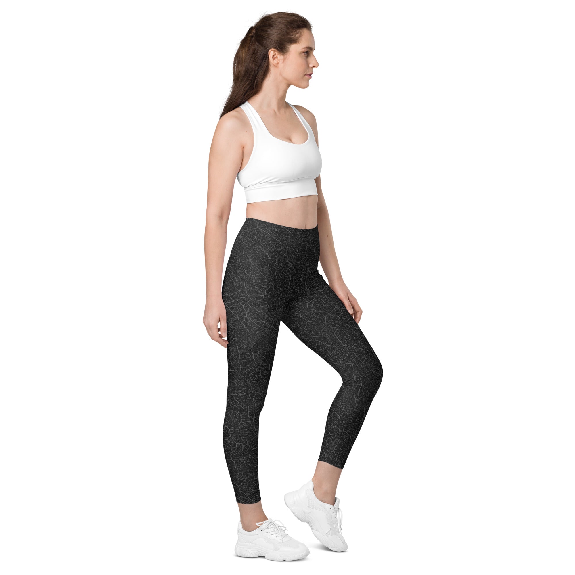 Embodying the essence of nature, Botanical Bliss leggings with leaf textures and pockets for outdoor adventures.