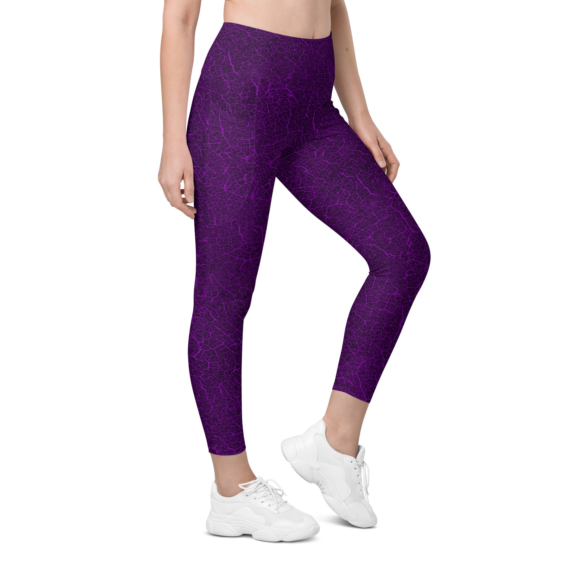 Leaf-patterned leggings with pockets, perfect for embracing the tranquility of serene woodlands.