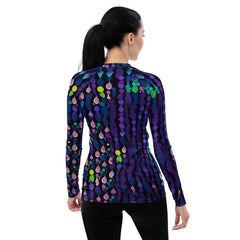 Vibrant women's rash guard with psychedelic pop design for surfing.