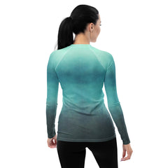 Close-up of Aurora Wave pattern on women's rash guard