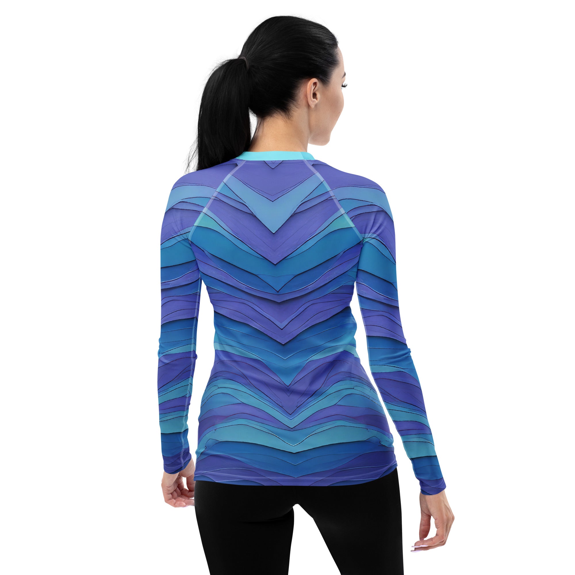 Women wearing Mystic Mountains patterned rash guard.