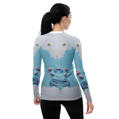 Vibrant feather print on women's rash guard.