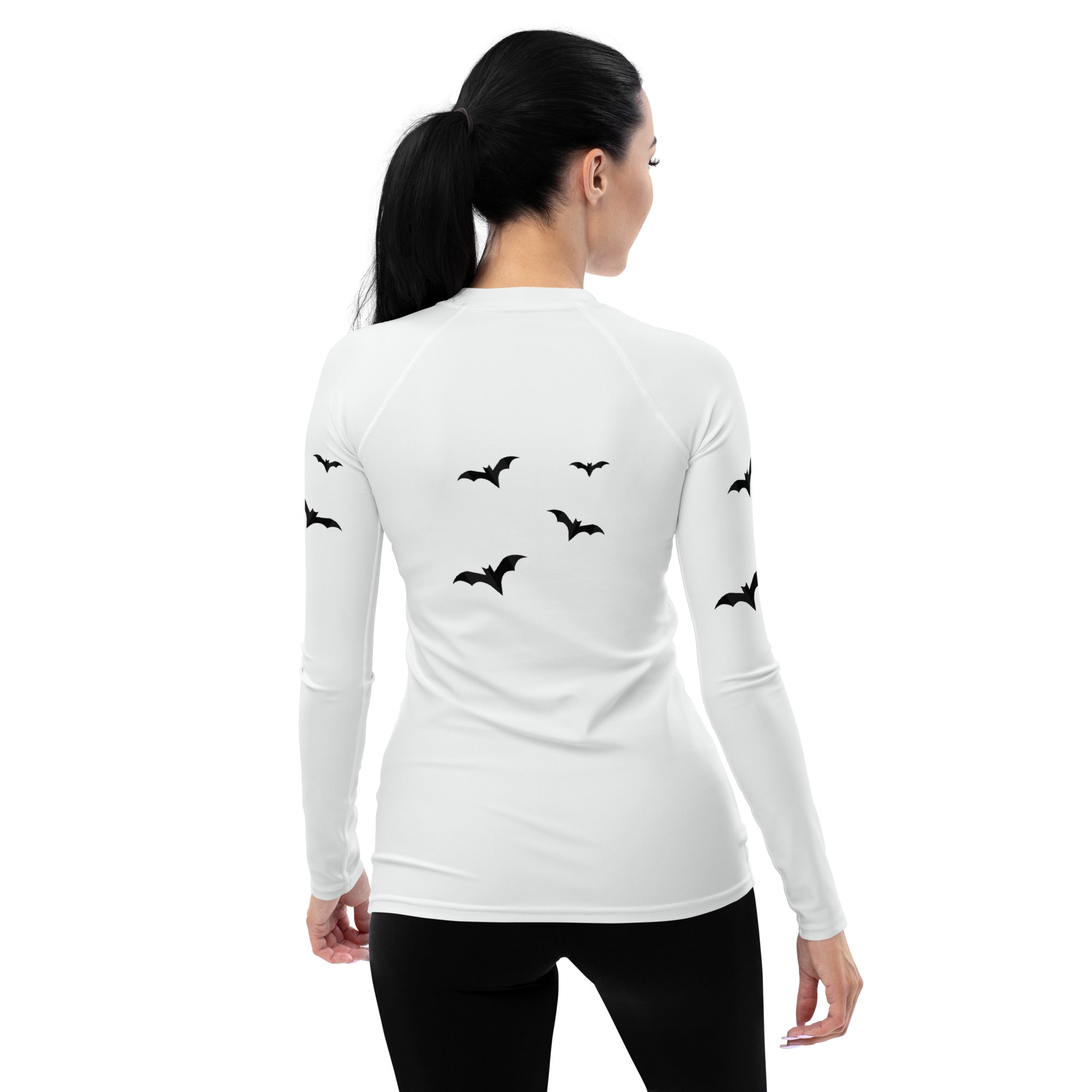 Close-up of spooky Halloween-themed rash guard for women
