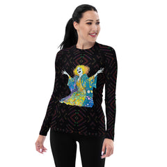 Woman surfing in Blossoms Breeze Women's Rash Guard adorned with subtle floral print.