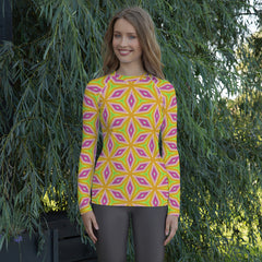 Woman wearing Tropical Bliss rash guard on the beach