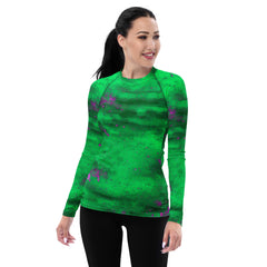 Women's rash guard with mud splatter design for water sports.