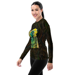 Floral Fusions Women's Rash Guard on a surfer at the sea.