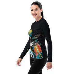 Rhythmic Waves women's rash guard displayed in a retail setting.