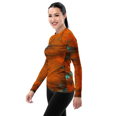 Stylish and functional ink blot art rash guard for women.