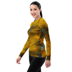 Women's rash guard with realistic grass stains design.