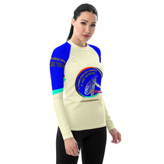 Model Wearing Celestial Stretch Women's Rash Guard at the Beach.

