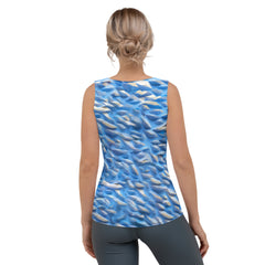 Woman wearing Reggae Vibes Tank Top featuring vibrant reggae-inspired patterns.