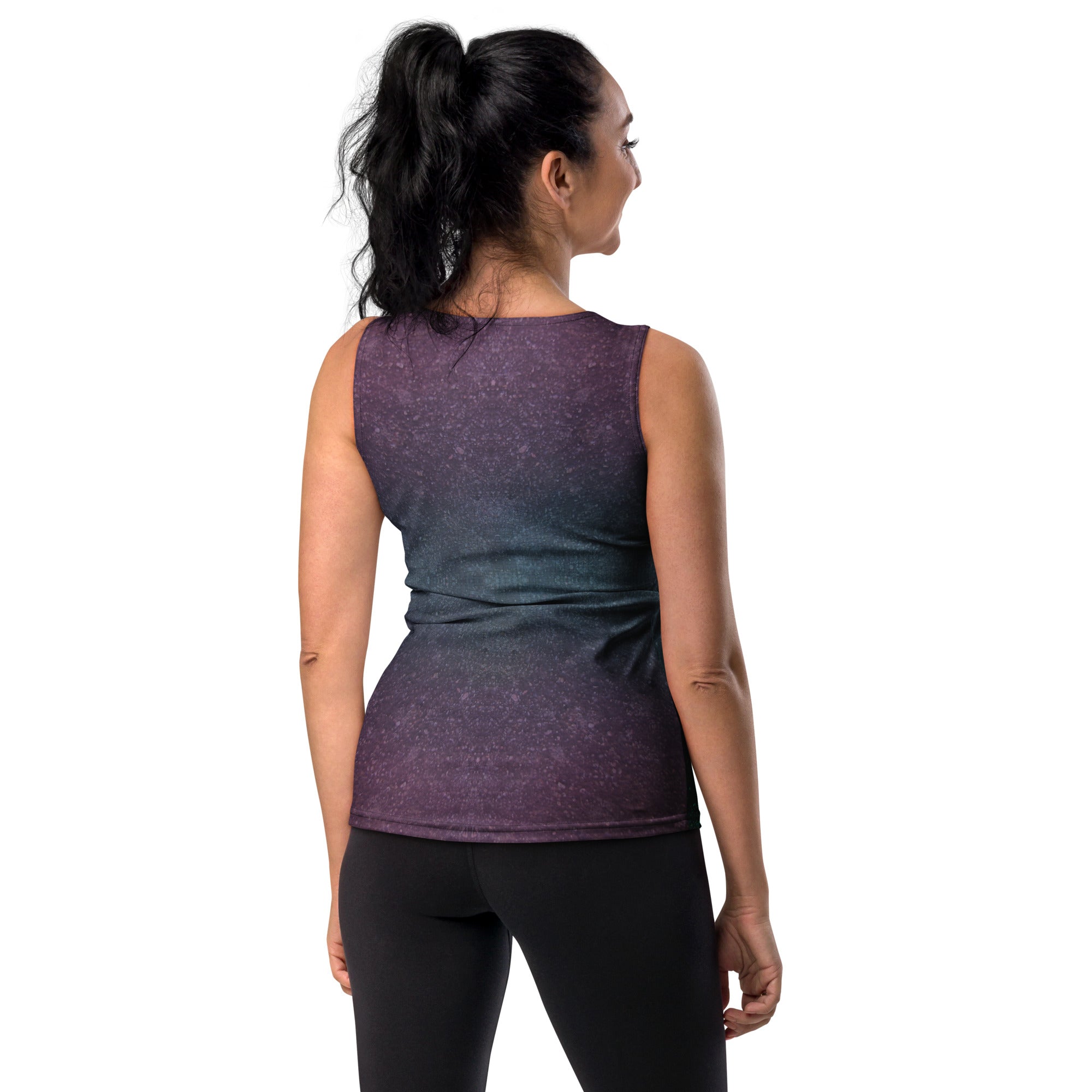 Woman wearing Galactic Glow Tank Top during a workout.