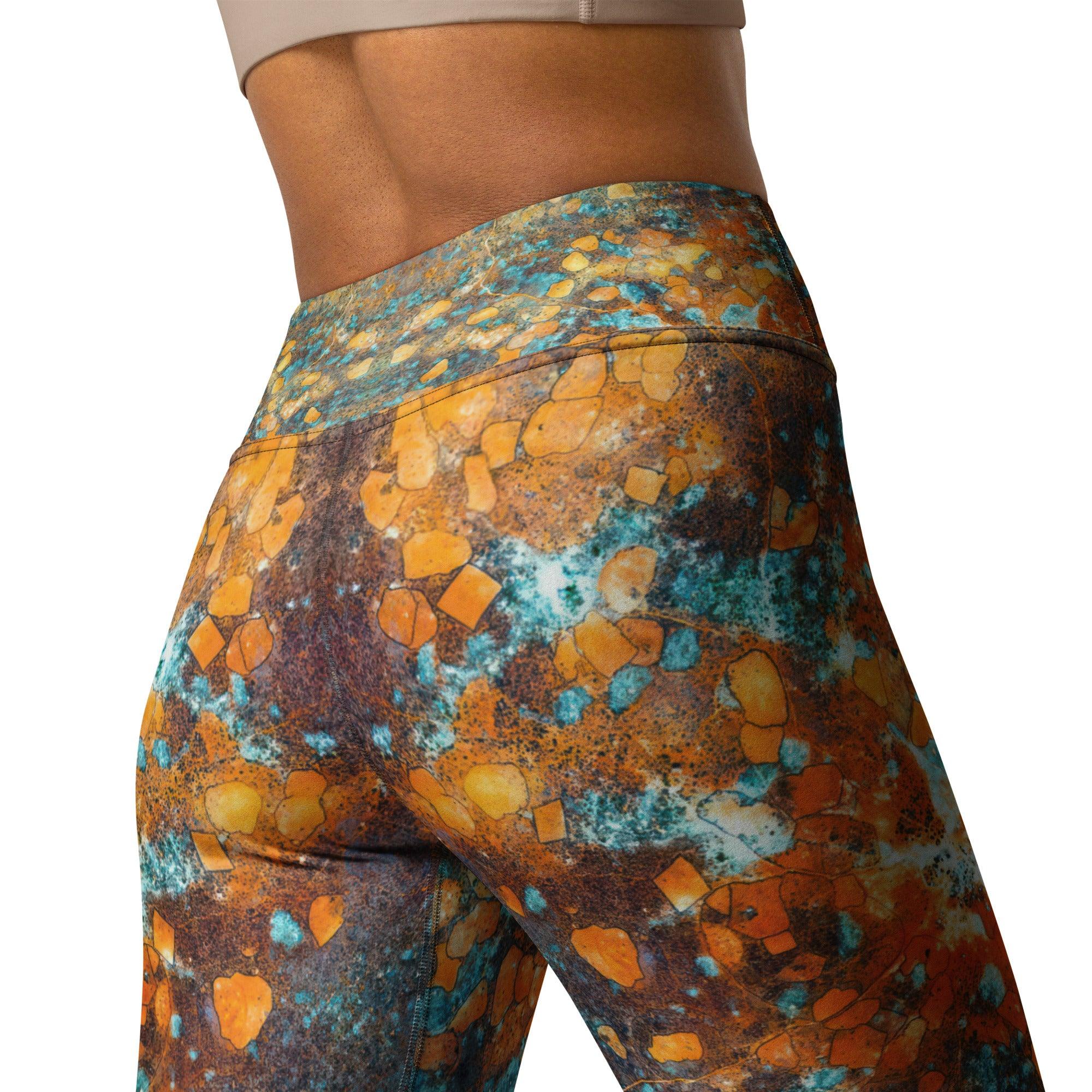 Close-up of colorful sparkle design on leggings.