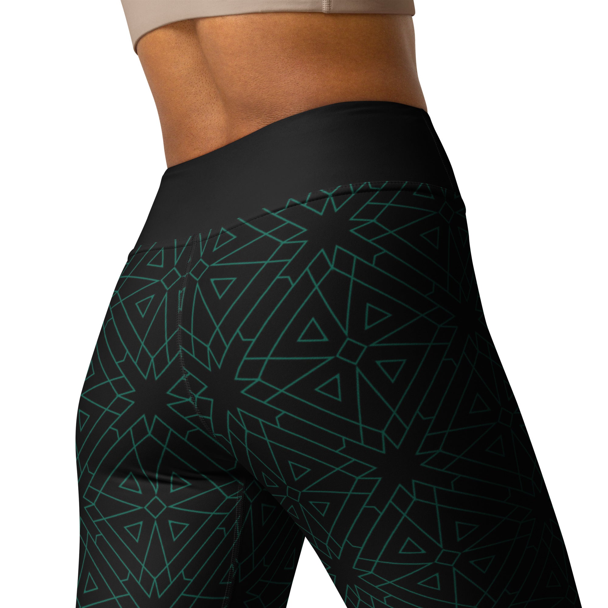 Close-up of the colorful Vibrant Vortex pattern on yoga leggings.