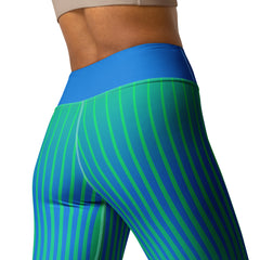 Woman doing yoga in colorful cascade gradient leggings.