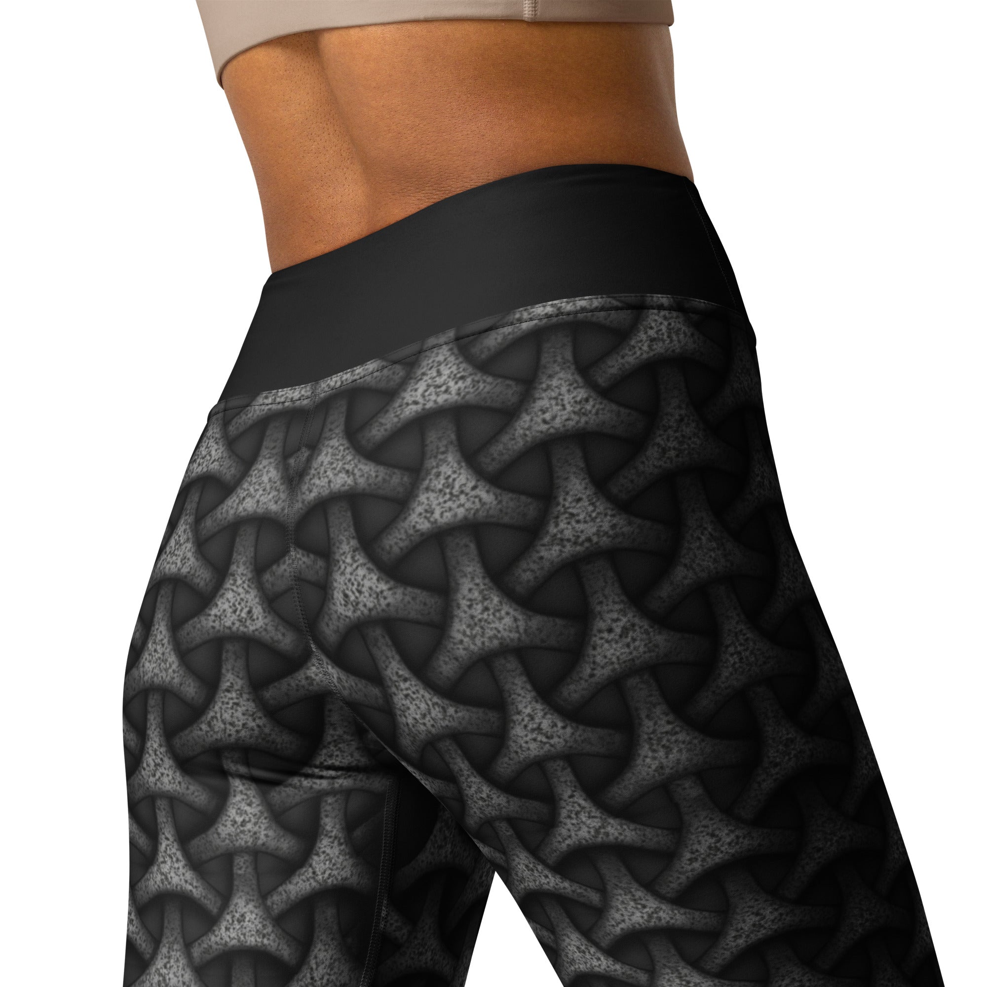 Displaying flexibility and style with Cosmic Fusion Tristar Yoga Leggings at the gym.