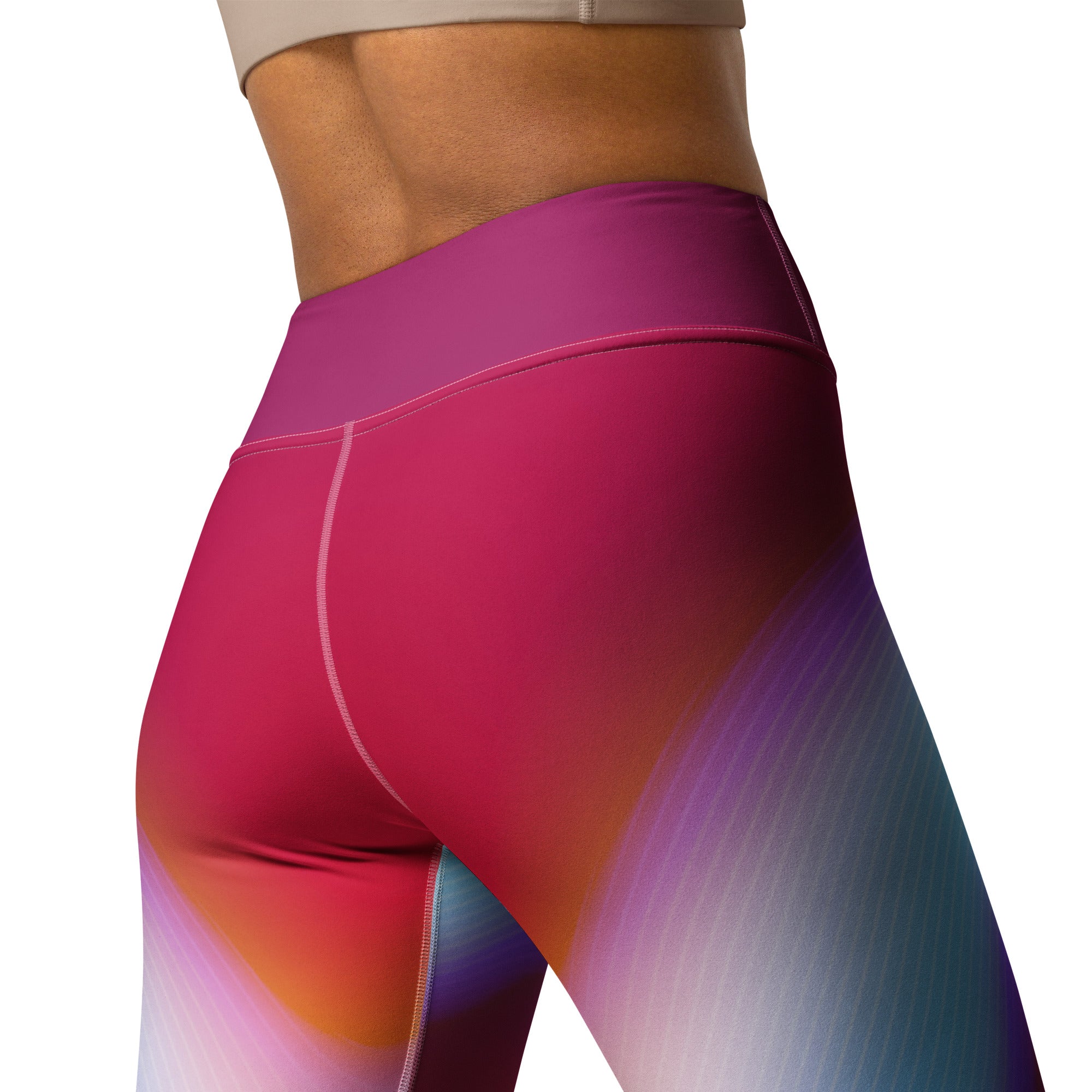 Detail of the vibrant sunset wave pattern on the Wavy Gradient Yoga Leggings.