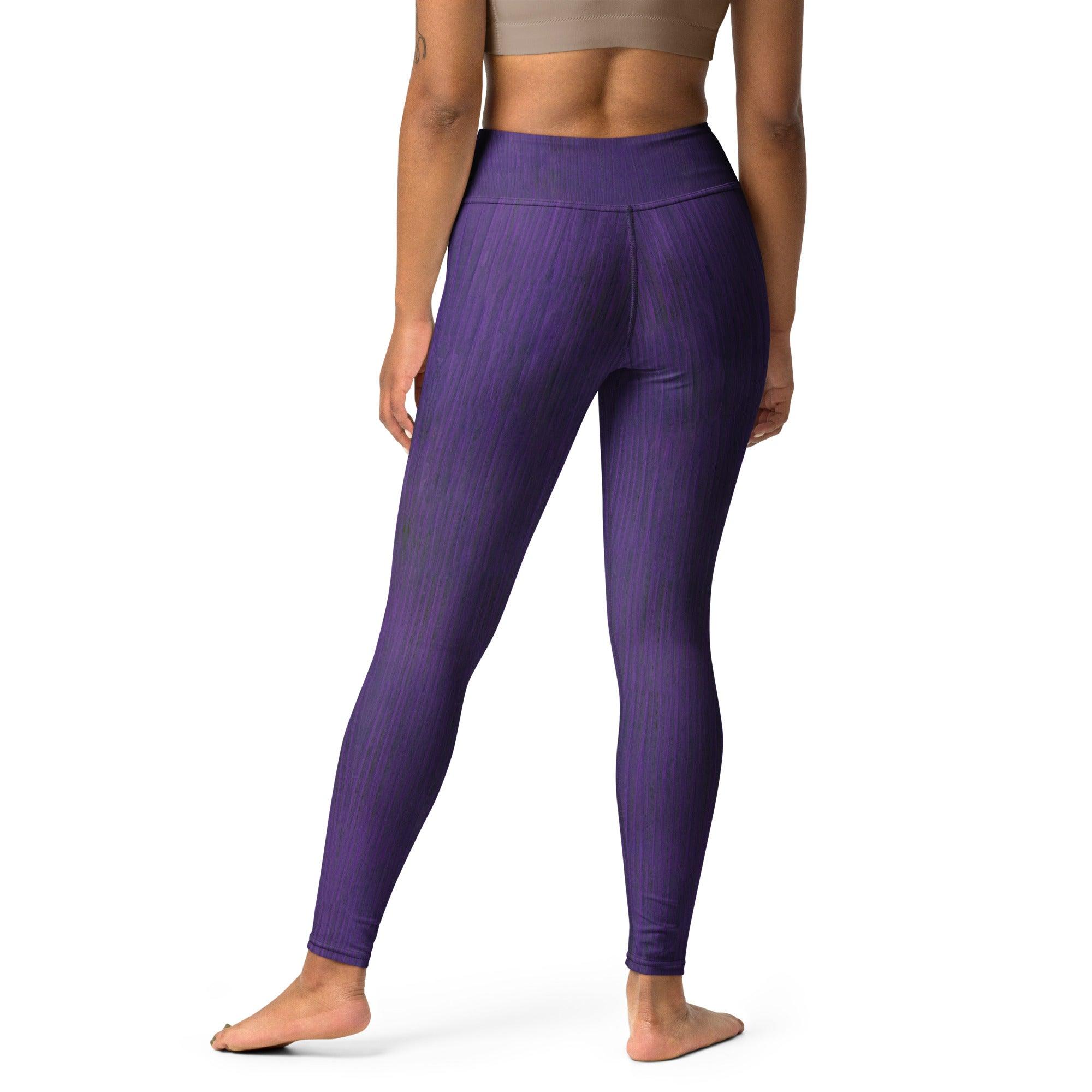 Deep purple yoga leggings product shot on white background.