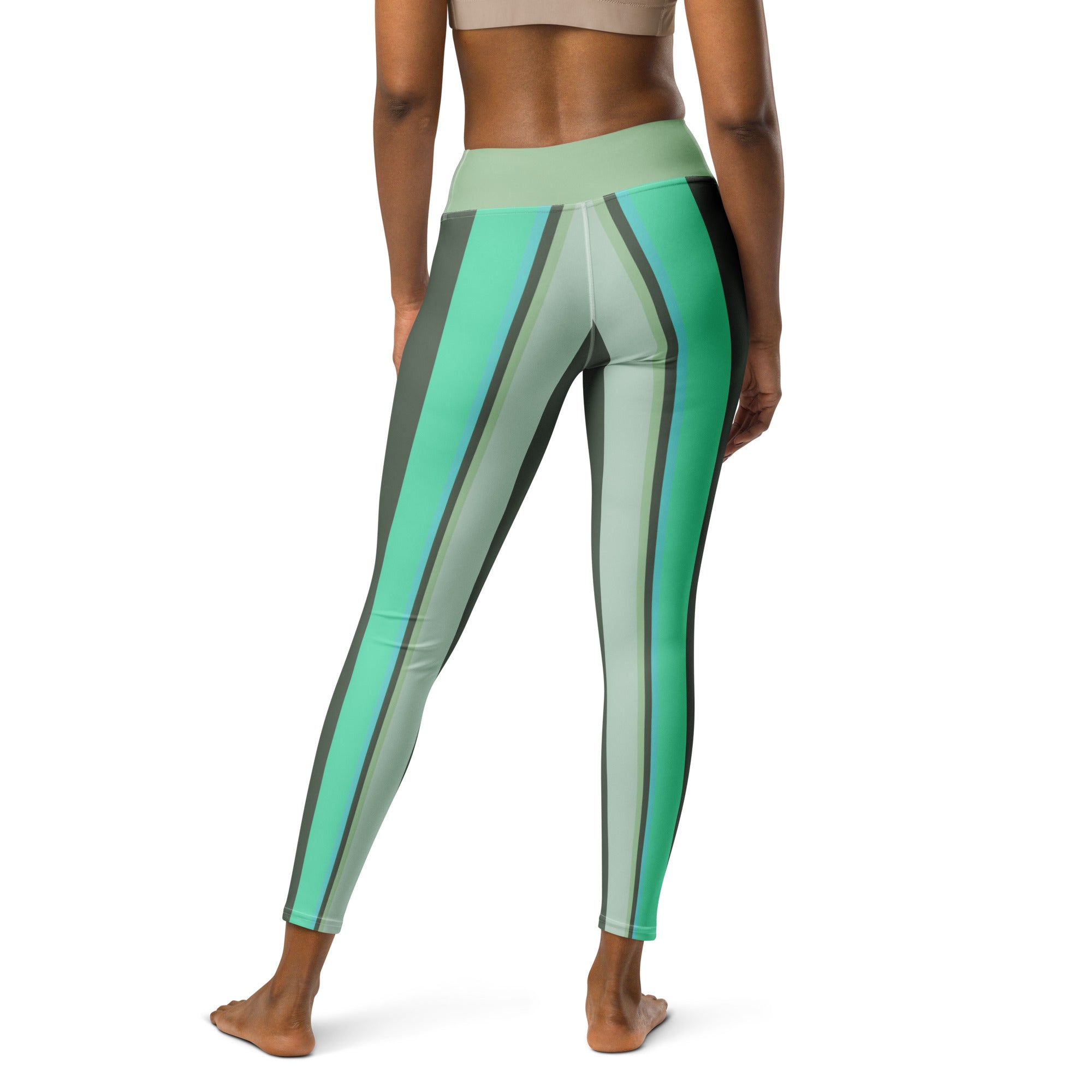 Elegant striped yoga leggings inspired by celestial patterns, offering both beauty and flexibility.