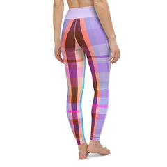 Eye-catching vintage-inspired leggings featuring a rainbow blast pattern, ideal for stylish yogis.