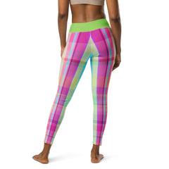 Energizing yoga leggings with an electric sunrise pattern, designed to motivate and inspire.