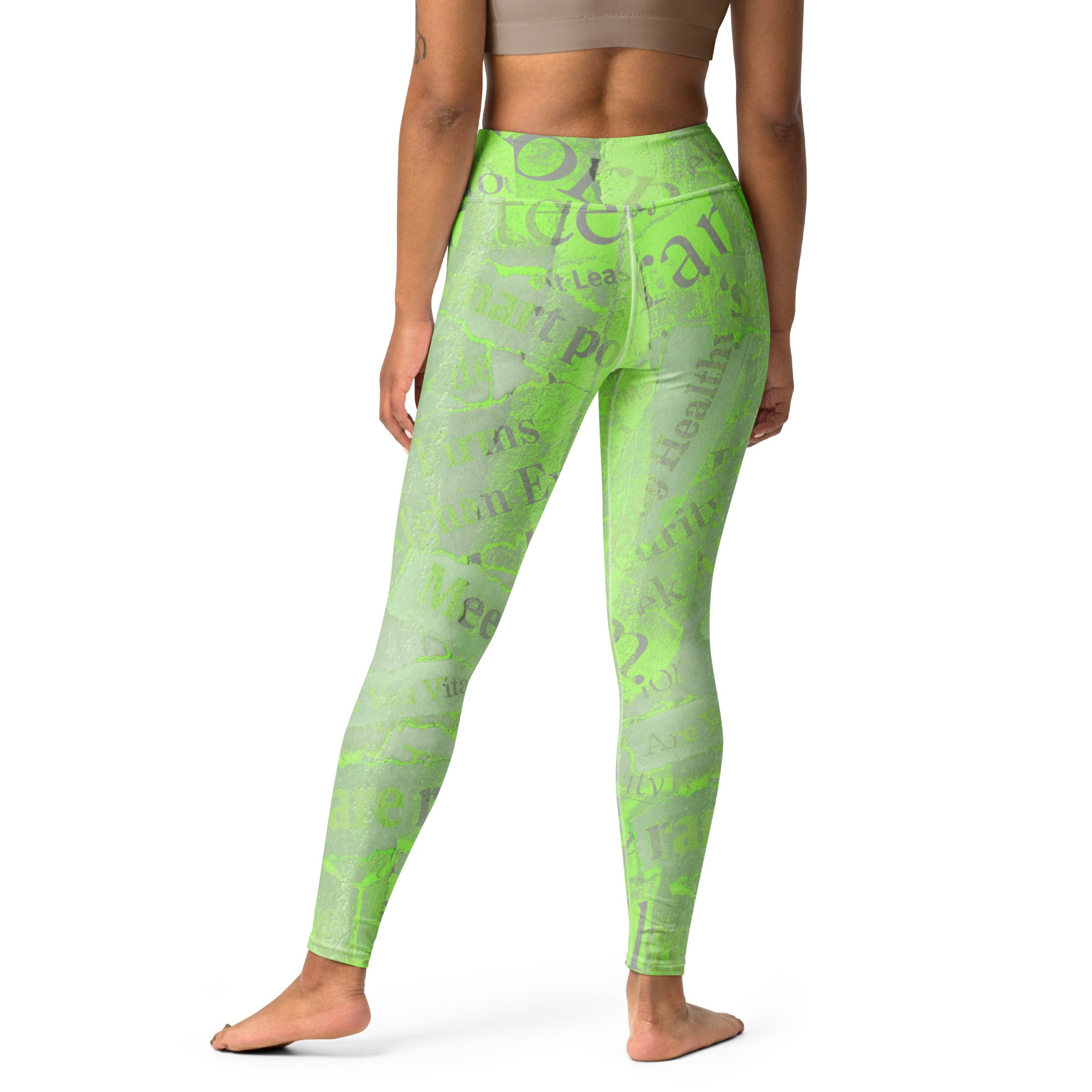 Newspaper Nouveau Yoga Leggings with eco-friendly yoga mat, ready for a session.