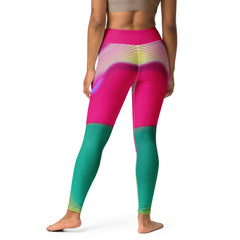 Dynamic yoga practice enhanced by the vibrant hues of Aurora Wave Yoga Leggings.