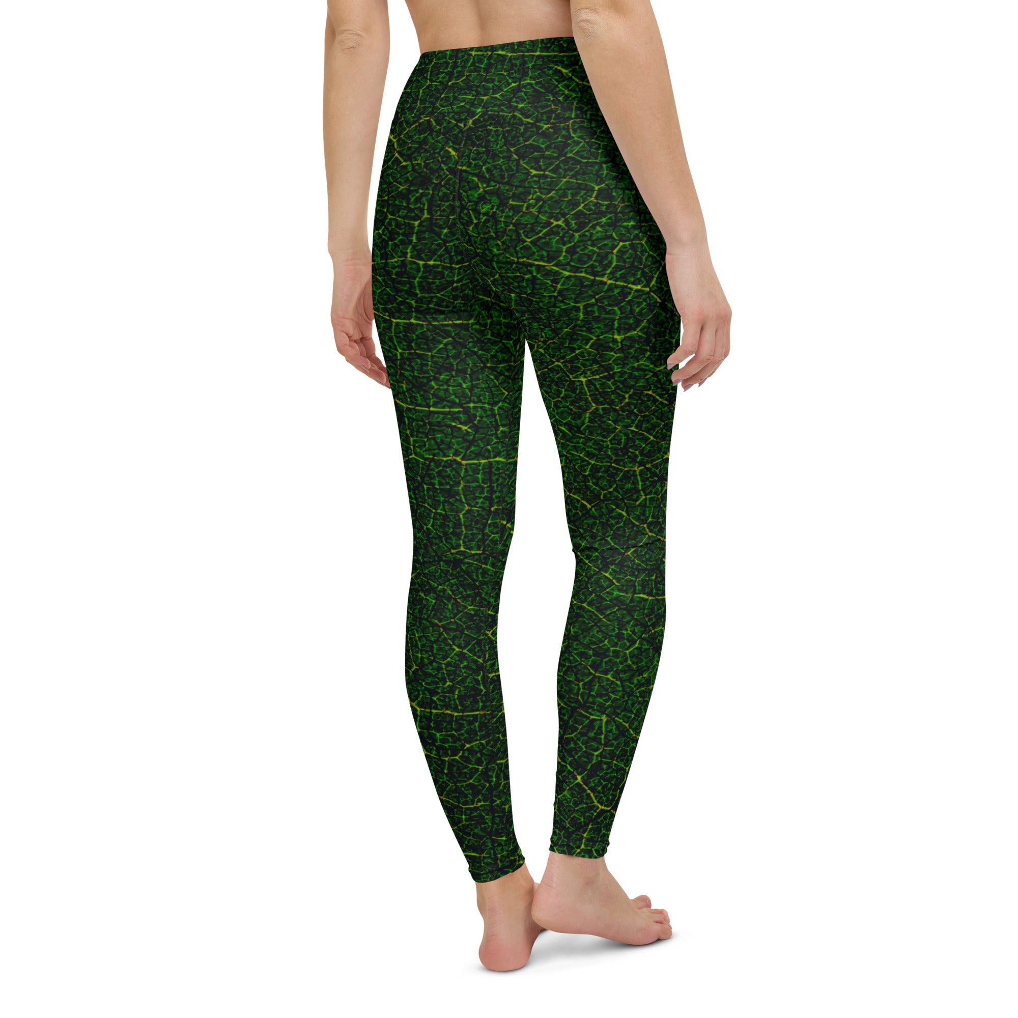 Detail shot of Verdant Vines Yoga Leggings’ fabric and print, focusing on the durability and detailed aesthetics for active and casual wear.