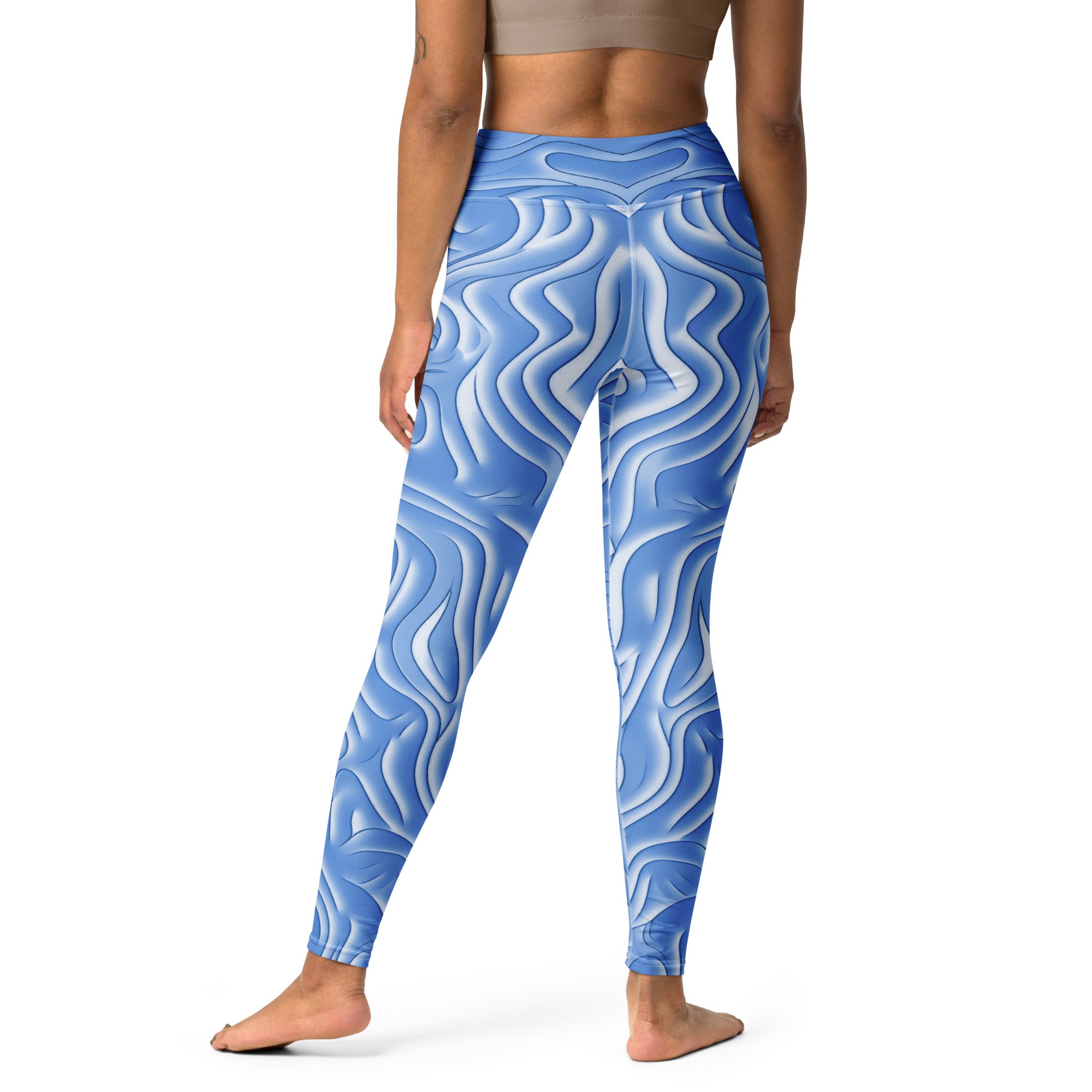 Electric Dreams All-Over Print Yoga Leggings on a clothing rack