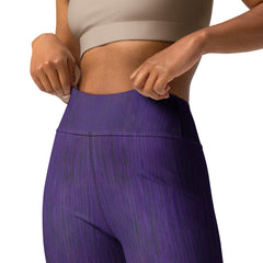 Deep purple yoga leggings lifestyle image in a gym setting.