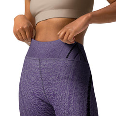 Woman wearing Purple Lines Yoga Leggings during yoga session.
