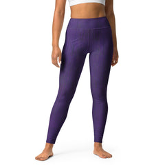 Close-up of deep purple yoga leggings fabric texture.
