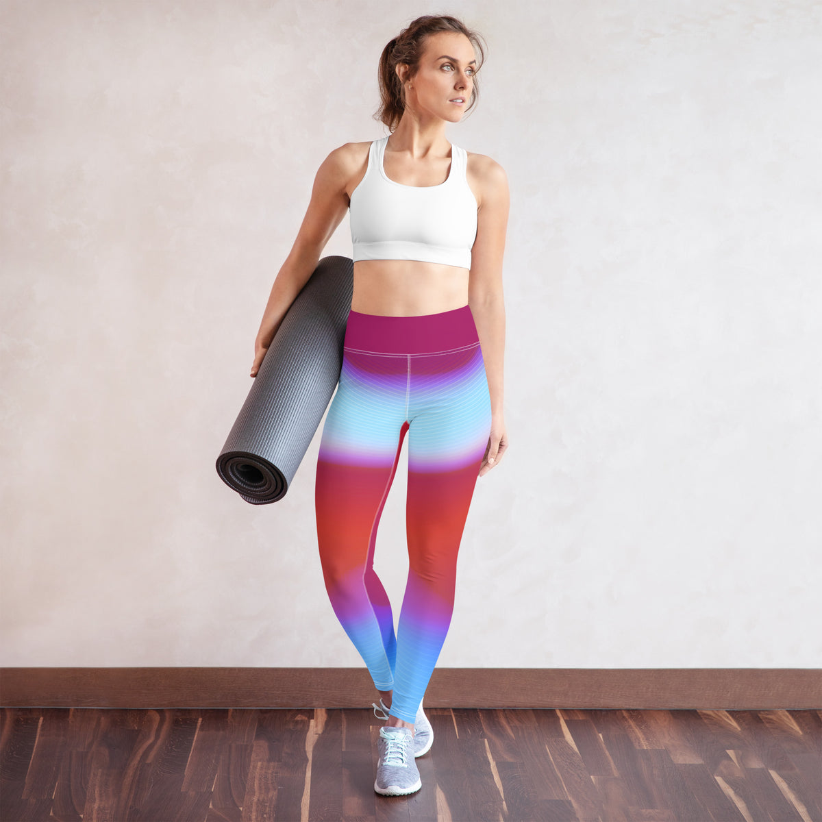 Practicing a tranquil yoga pose in the Celestial Tide Wavy Gradient Yoga Leggings.