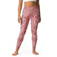 Oceanic Rhythm All-Over Print Yoga Leggings on a clothing rack.