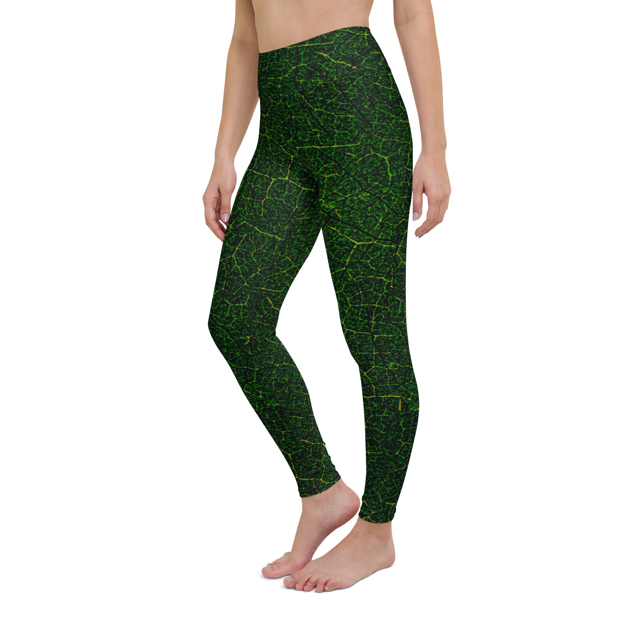 Verdant Vines Yoga Leggings displayed, emphasizing the captivating greenery design and body-hugging fit perfect for yoga enthusiasts.