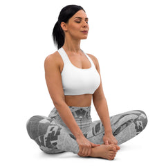 Woman practicing yoga wearing Quite Earth III Leggings.