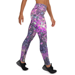 Woman wearing Colorful-Sparkles-II leggings doing yoga in the park.