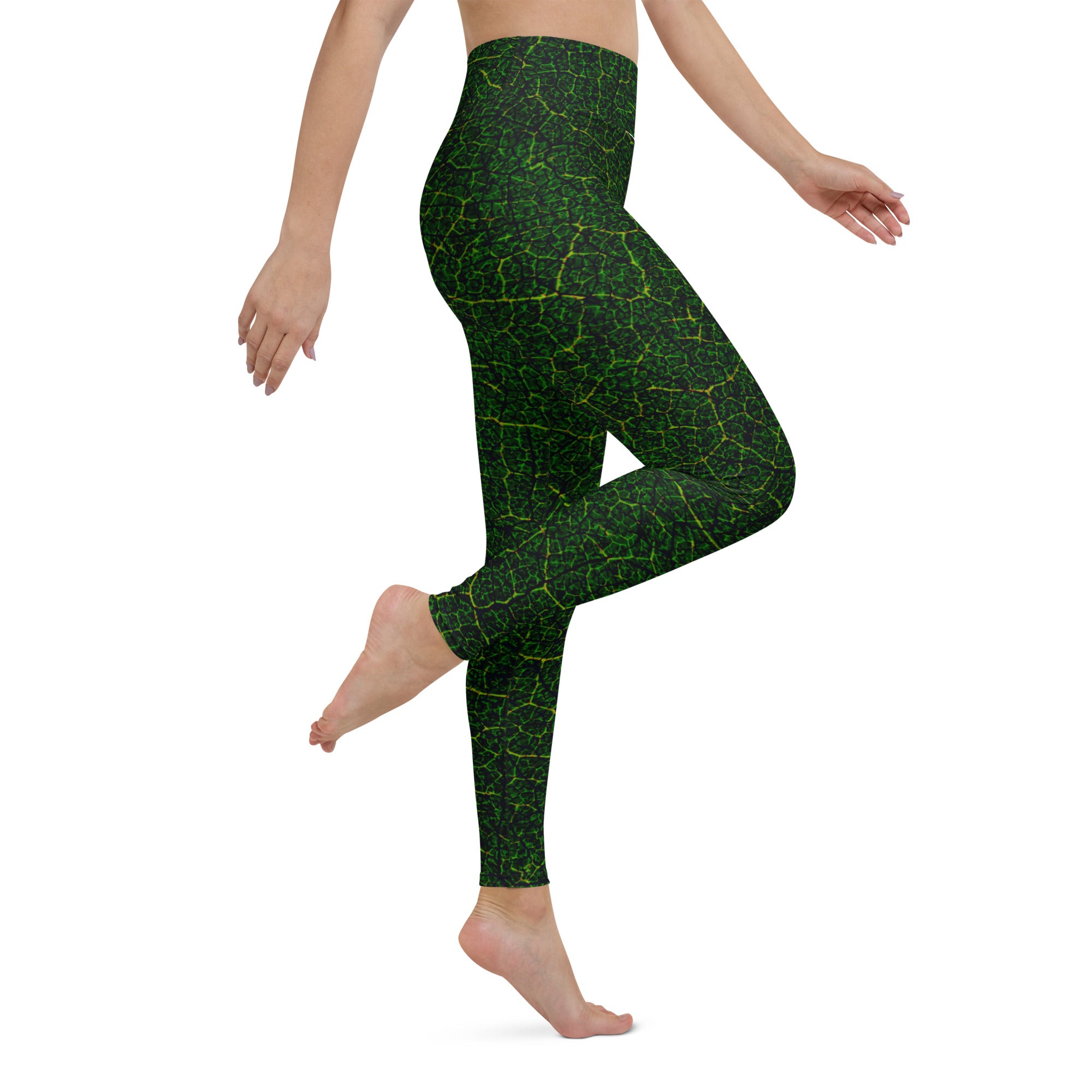 Outdoor yoga session in Verdant Vines Yoga Leggings, merging practice with the lush beauty of a garden setting.