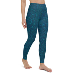 Practicing yoga in Enchanted Forest Yoga Leggings, showcasing their mystical forest print and supportive stretch.