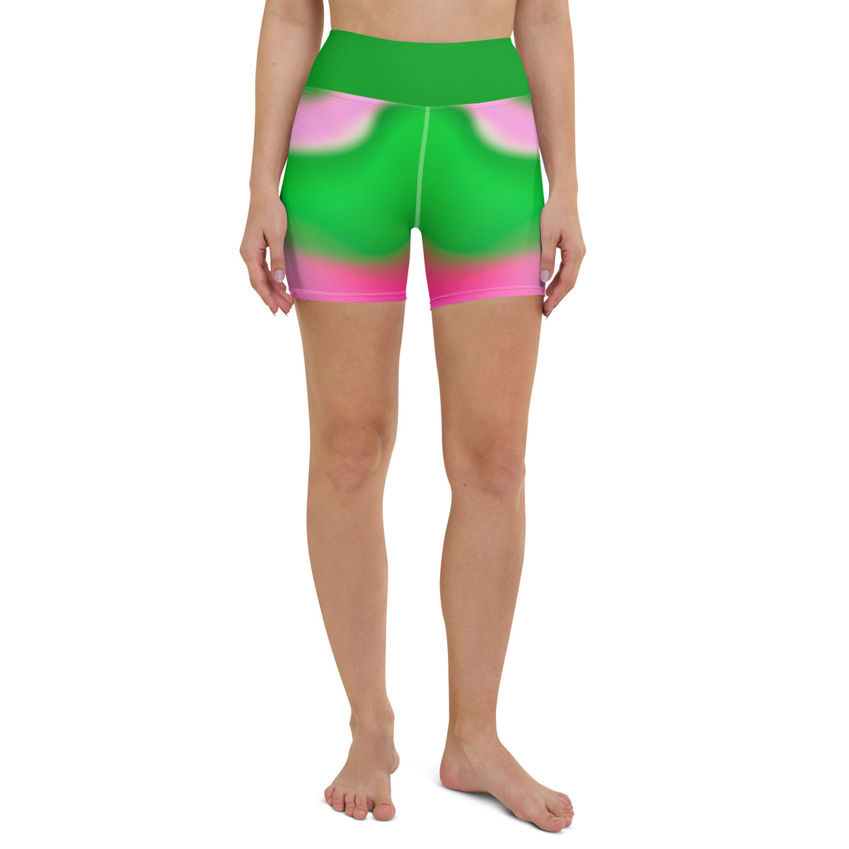 Performing a beach yoga session in Ocean Breeze Wavy Gradient Yoga Shorts.