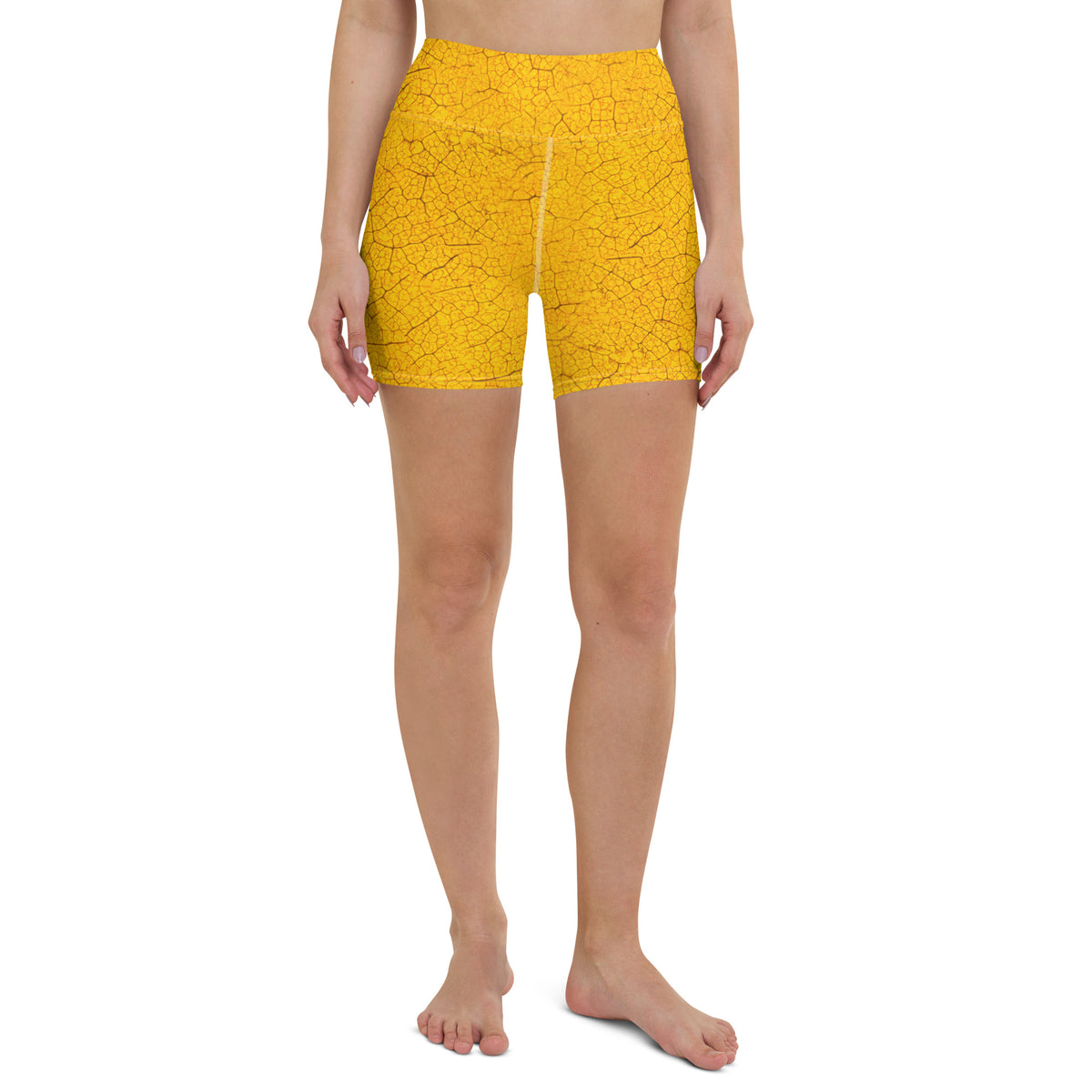 Practicing yoga in Leafy Comfort Yoga Shorts, showcasing the breathable fit and stylish leaf pattern.