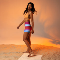 Practicing yoga at dawn in Tranquil Tide Wavy Gradient Yoga Shorts.