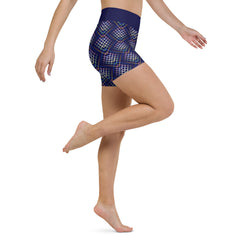 Pair of Vibrant Vortex Yoga Shorts laid flat