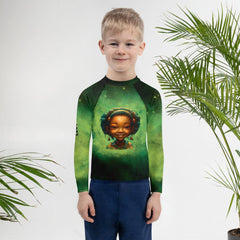 Kid swimming in pool wearing Angelic Iris Kids Rash Guard.