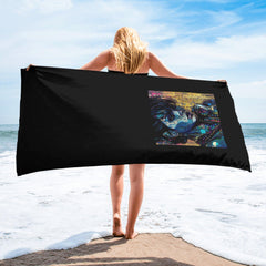 Vibrant Artistic Adventure Towel Spread on Beach.