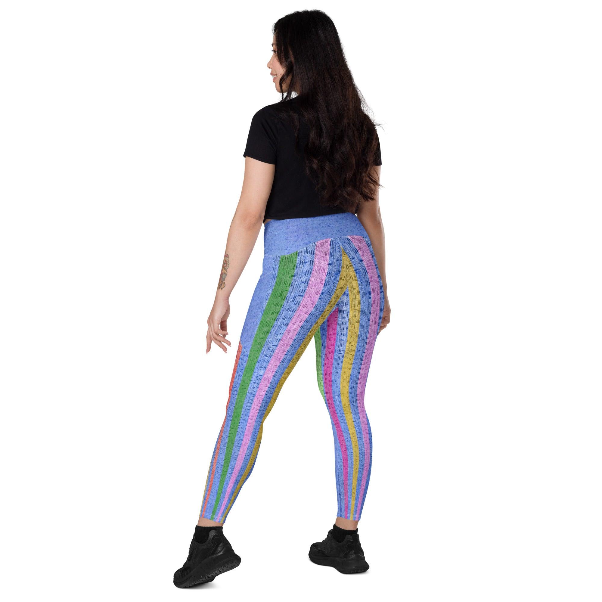 Active wear crossover leggings featuring unique line art and convenient pockets.