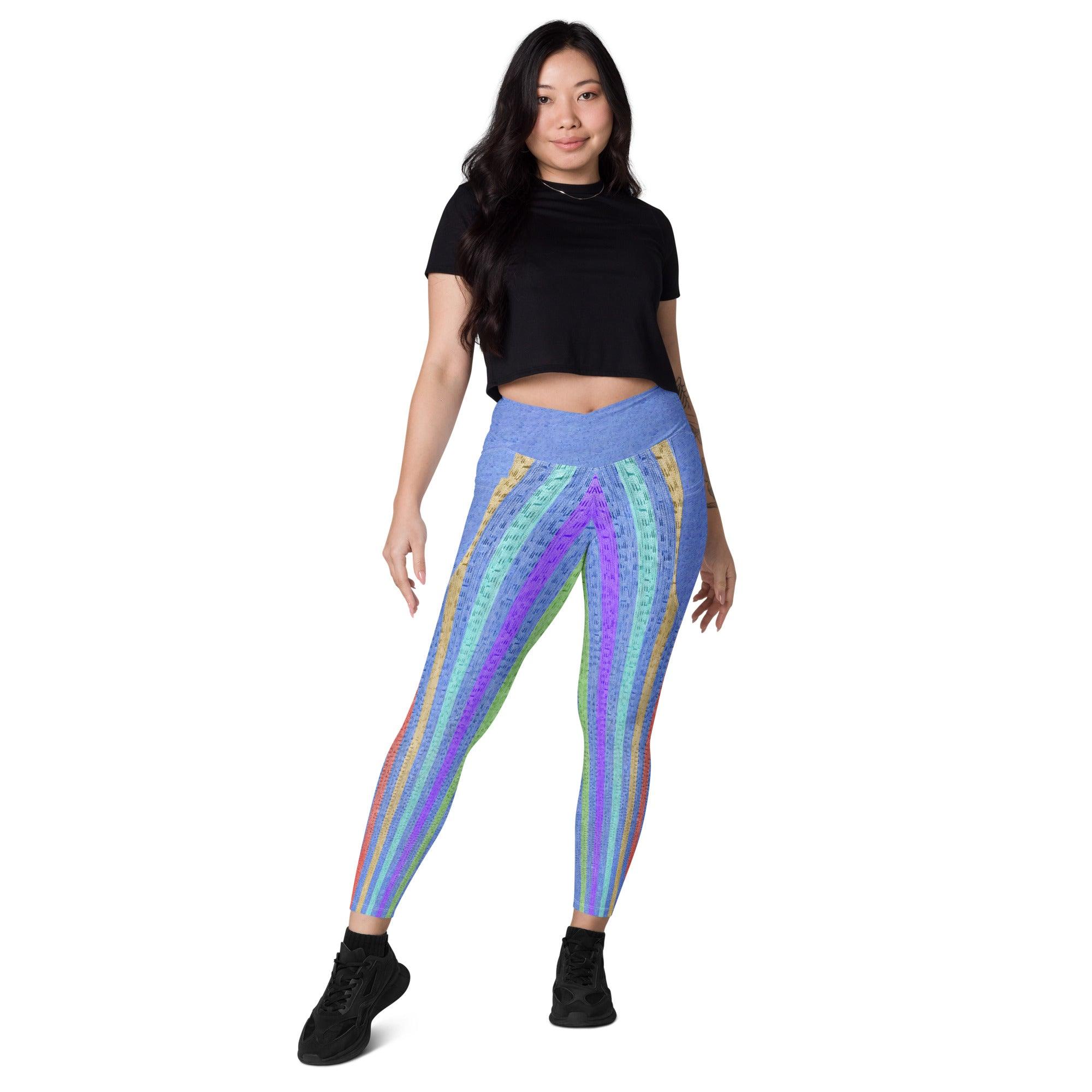 Vibrant line patterned crossover leggings with pockets for on-the-go style.